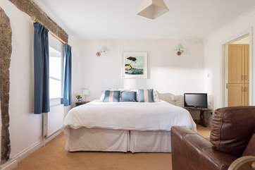 The ground floor bedroom is accessed just off the hallway.