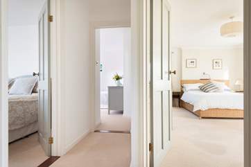 The landing at the top of the stairs leads to three further bedrooms and the family bathroom.