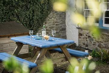 Sit in the courtyard and enjoy a peaceful glass of wine.