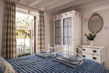 Pretty vintage furniture adds a chic touch.