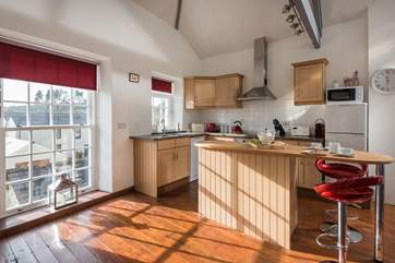 The kitchen area is well equipped for holiday catering.