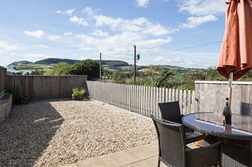 Enjoy eating outside on this fabulous patio, with views right across to Golden Cap.