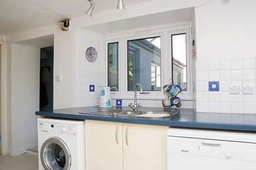 The kitchen has views into the garden.