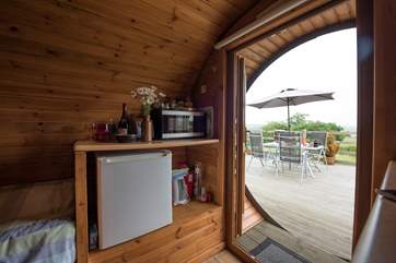 You also have your little kitchen-area within the Living Pod with microwave, fridge, kettle and a flatscreen TV too.