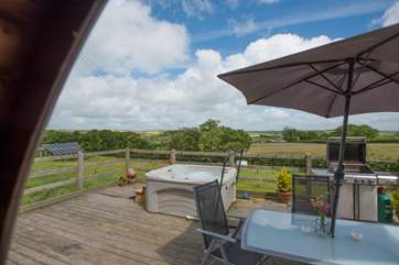 Relax in the hot tub on the deck and soak up the sights and sounds of rural countryside.