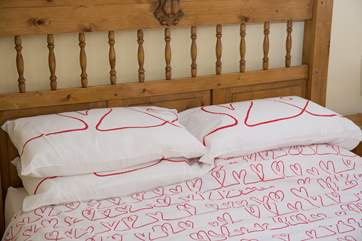 The double bed in Bedroom 1.
