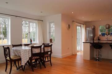 The dining-area with the kitchen-area behind.