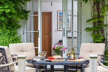 The kitchen leads out onto the decking.