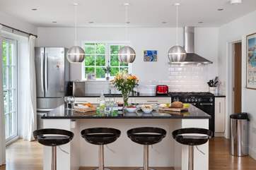 For a more informal meal, hop on one of the barstools.