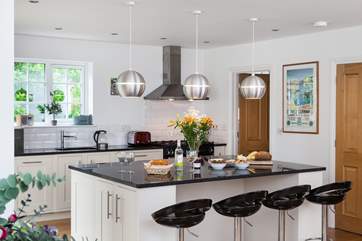 The kitchen is spacious and gorgeous, and very well equipped.