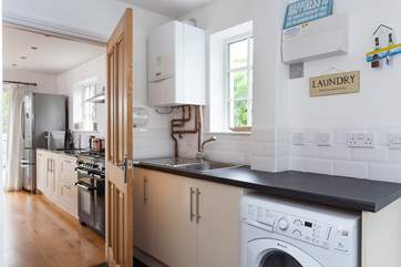 There is a really useful utility room which leads off from the kitchen.