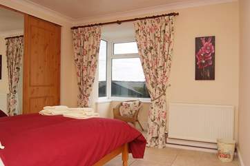 The ground floor double bedroom (Bedroom 1).