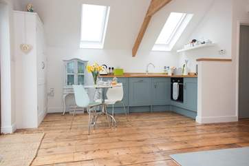The kitchen/dining areas.