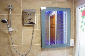 An infinity mirror adds a touch of fun.