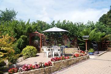 There is a lovely sitting-area for guests directly opposite the cottage.