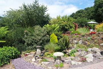 Part of the Owners' beautiful garden which is immaculately maintained.
