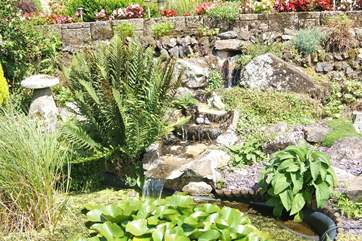 The pretty water feature in the garden.