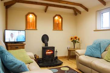 The little wood-burner keeps the cottage wonderfully warm.