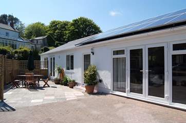 Downalong stands apart from the Owners' home (top left in the photograph).