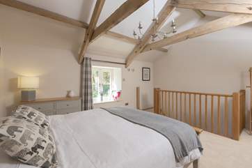 This bedroom is on the first floor above the living room