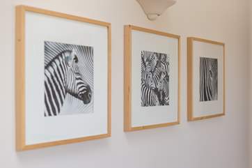 Artwork on the walls gives an extra personality to the cottage.