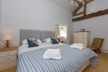 This bedroom is exceptionally spacious and beautifully presented.
