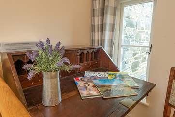 A mix of antique and modern furnishings adds a lovely feel to the cottage