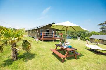 With plenty of space to play, a barbecue and picnic table are also provided for al fresco dining.