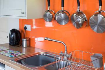 The kitchen splashed with colour.