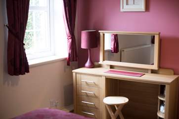 The dressing area in bedroom 2.