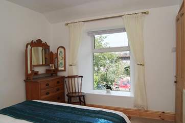 The double bedroom looks out to the front of the cottage.