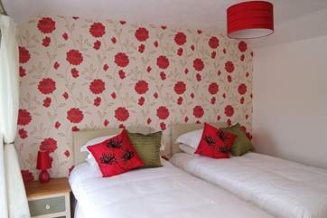 Bedroom 2 is furnished with versatile 'zip and link' (double or twin) beds.