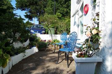 The front courtyard may be small but it is a lovely spot to sit and watch the world go by.