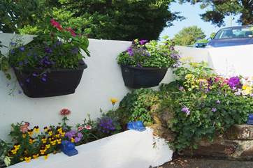 Every available corner is beautifully planted with colourful flowers.
