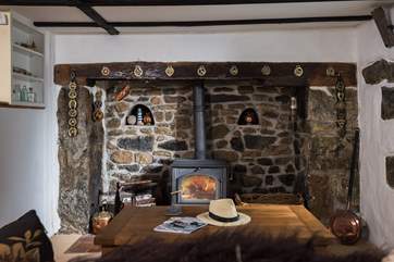 The multi-burner in the old stone fireplace is ideal for out-of-season breaks.
