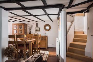 The staircase (mind your head!) turns its way up to the first floor.