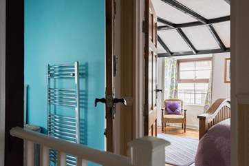 The bathroom is next to the double bedroom and just across the landing from the other two bedrooms.
