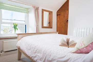 This light and spacious room is at the front of the cottage.