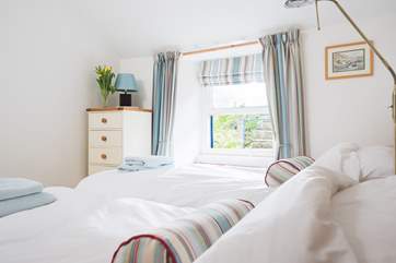 The pretty twin room is at the back of the cottage.