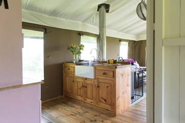 A kettle and toaster are provided in the kitchen area.