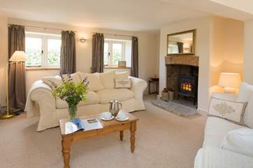 There is a lovely tranquil sitting-room with a wood-burning stove as an extra treat for out-of-season holidays or cool evenings.