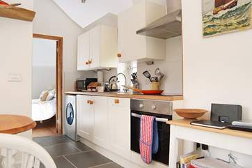 The modern kitchen is not only stylish but very well-equipped.
