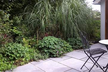 The pretty private patio is a lovely area to sit and relax.