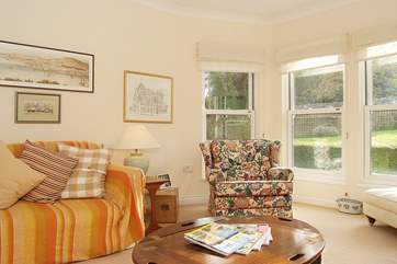 You can sit in the bay window and watch the antics of the local birds and squirrels out in the sheltered garden.