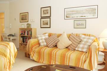 There is a lovely collection of artwork and prints throughout the apartment.