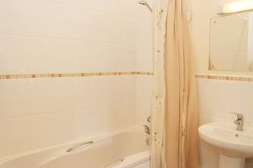 There is a hand shower attachment over the bath for those who prefer to shower.