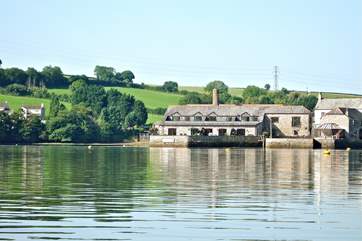 Riverside Cottage is the property on the left of the group of converted buildings with the water on two sides.