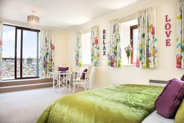 From the double bedroom you can step out to the sun-trap of a balcony.