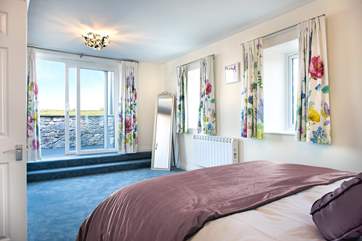 Sliding doors lead out to the balcony where you can enjoy more of those fabulous views