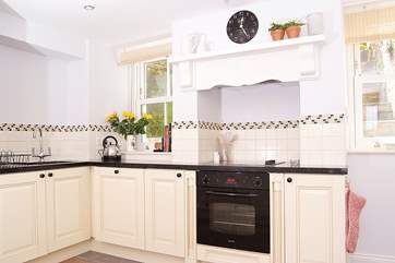 Another view of the kitchen. Through the window you can see the little rear courtyard - which is just for your access to logs.